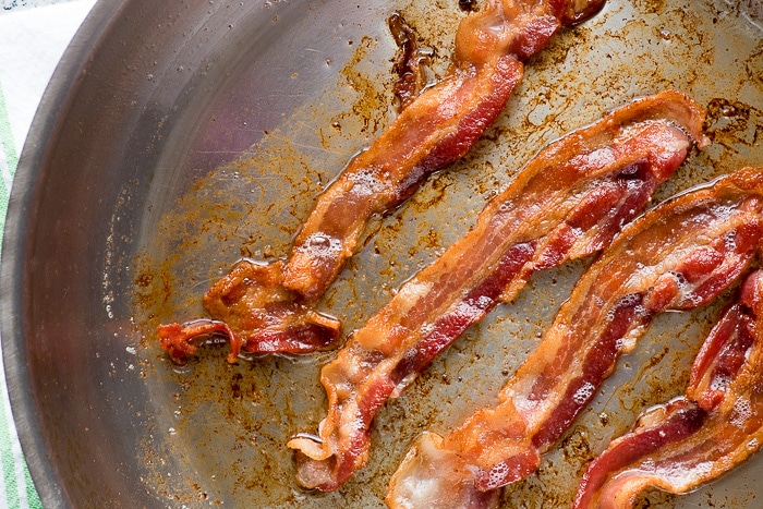 cooked bacon in a skillet
