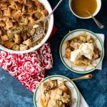 banana foster bread pudding in a baking dish and servings dished out onto plates