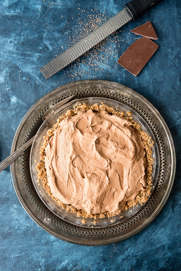 Fluffy French Silk Pie with whipped cream topping