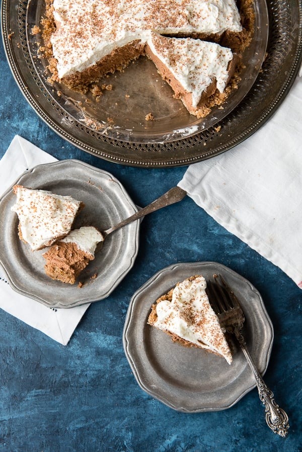 French Silk Pie with Oatmeal Cookie Pie Crust with whipped cream on top - slices