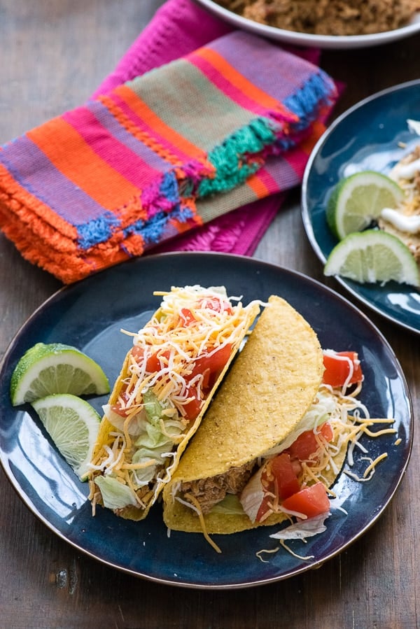 A plate of food on a table, with Chicken Tacos