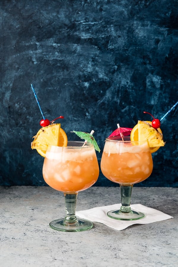 two tropical zombie cocktails in stemmed glasses