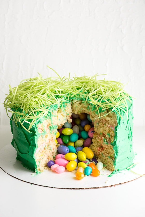 Easter Egg Pinata Cake (a box mix hack) with candy spilling out