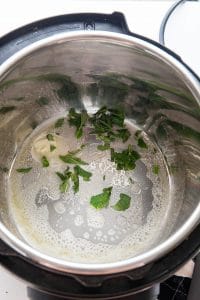 melting butter and mint in an Instant Pot