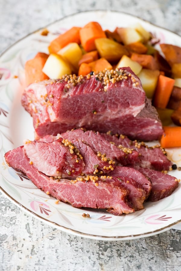 Instant Pot Corned Beef Brisket in Beer with vegetables served on a platter