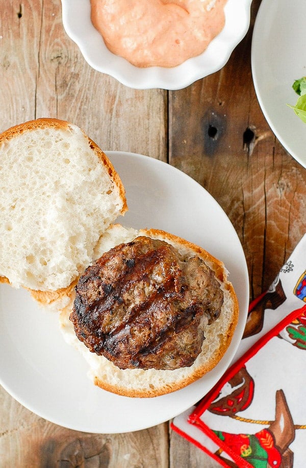 Freshly grilled hamburger on a gluten-free bun