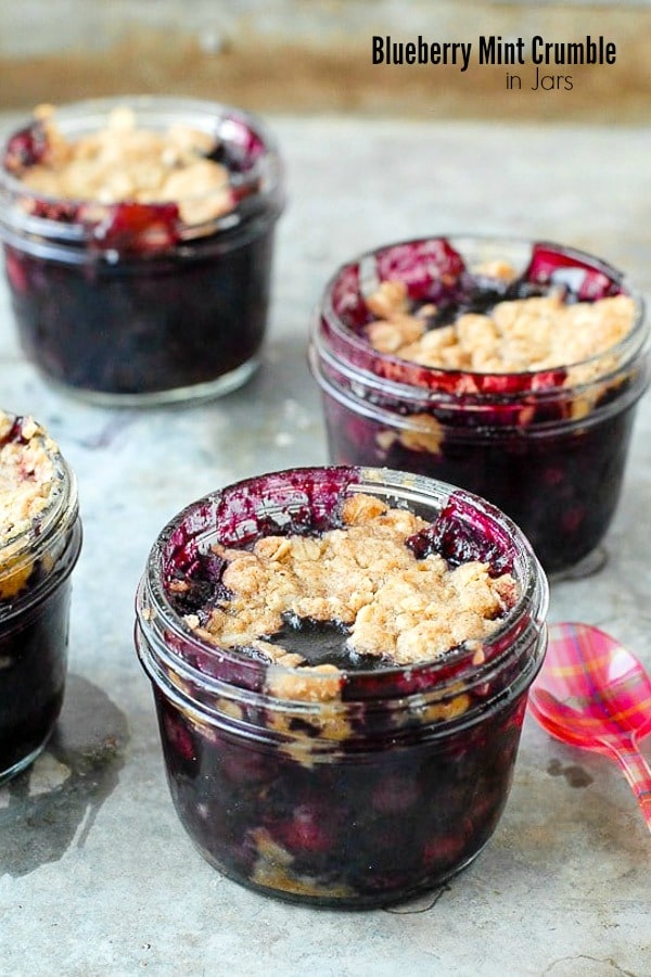 Freshly baked Blueberry Mint Crumble in Mason jars