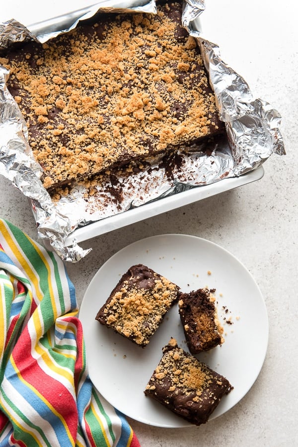Fudgy, soft gluten-free Chocolate Chip Cookie Stuffed Brownies in a baking pan