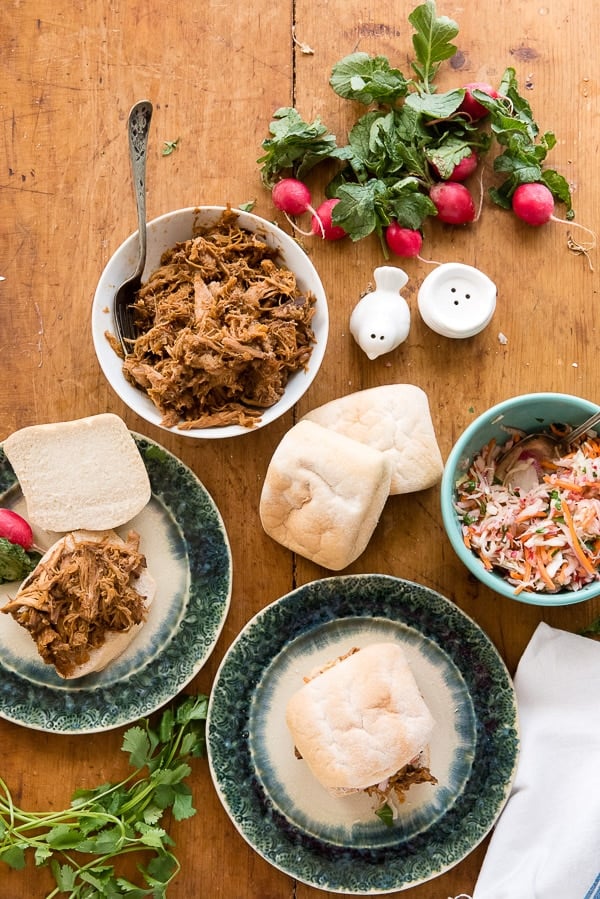 Slow cooker pulled pork, gluten-free white rolls, radishes, radish slaw and sandwiches 