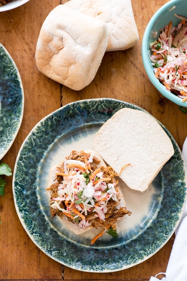 pulled pork sandwiches with crunchy, fresh radish slaw and gluten-free rolls 