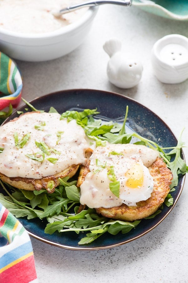 Piping hot from the skillet gluten-free English Muffin French Toast with poached egg and bacon-maple gravy