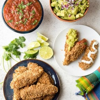 Crsip, freshly baked gluten-free Taco Chicken Tenders with salsa, guacamole