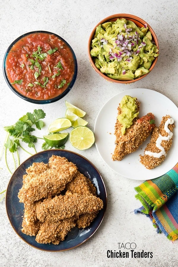 Crsip, freshly baked gluten-free Taco Chicken Tenders with salsa, guacamole