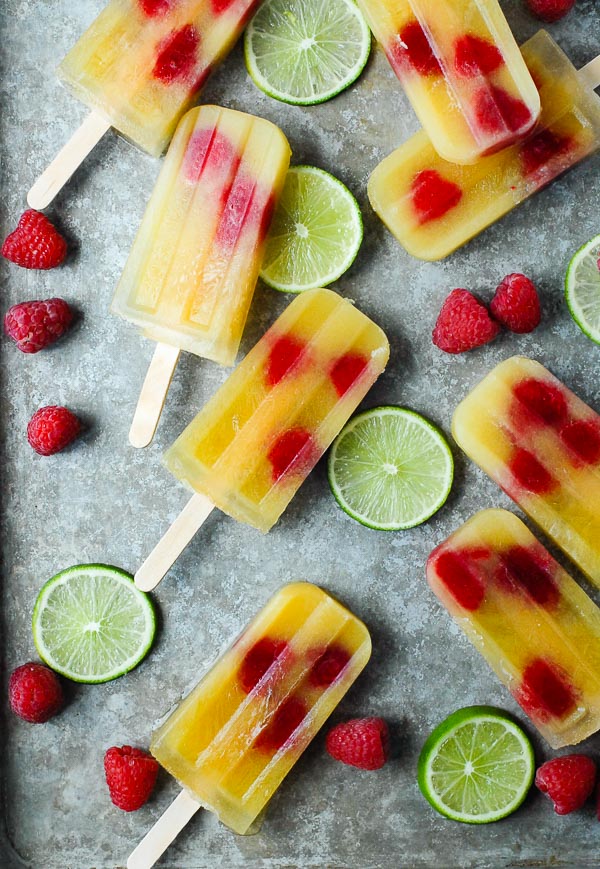 Coconut Water Pineapple Popsicles with raspberries and lime 