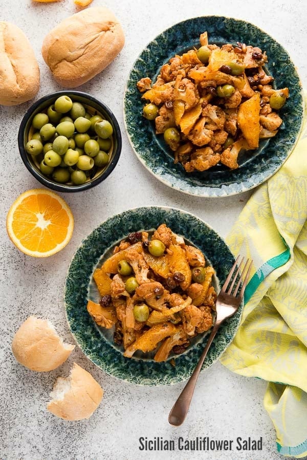 Flavorful Sicilian Cauliflower Salad (vegan) with oranges, green olives, raisins and capers 