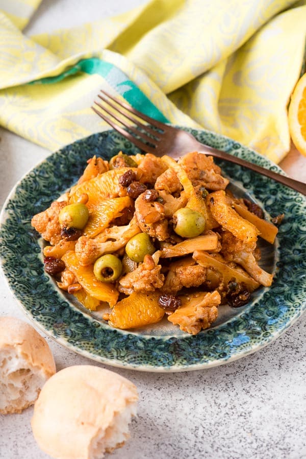 Single serving of Sicilian Cauliflower Salad with green olives, and oranges 