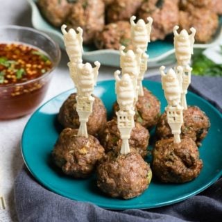 Thai Chicken Meatballs with vintage Buddha cocktail sticks and Sweet-Spicy dipping sauce