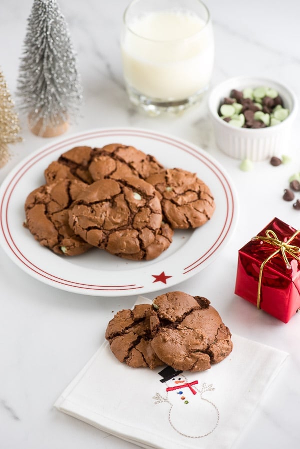 Chewy Chocolate Mint Truffle Cookies with milk on white plate