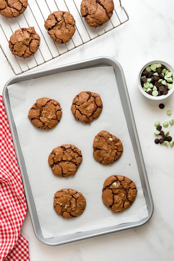 Chocolate Mint Truffle Cookies on a silver baking sheet wtih red and white napkin