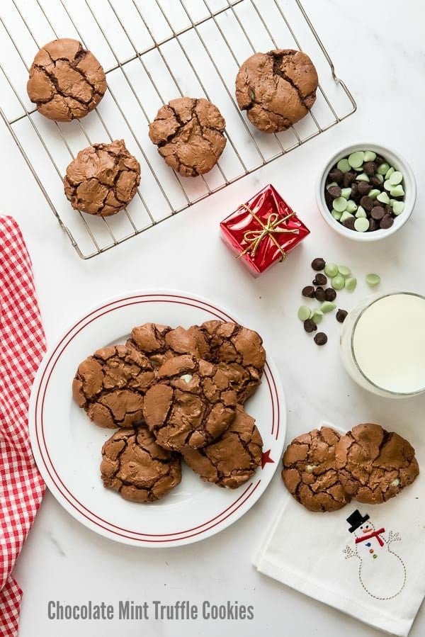 Chewy rich Chocolate Mint Truffle Cookies on a white plate with red rim