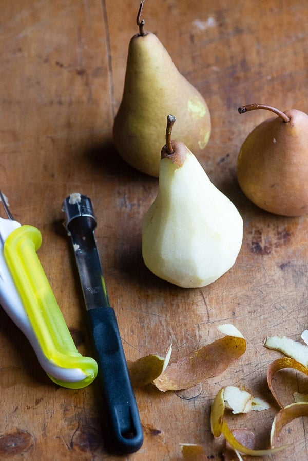 Partially peeled Bosc pear 