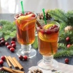 cranberry apple hot toddy in glass mugs crop
