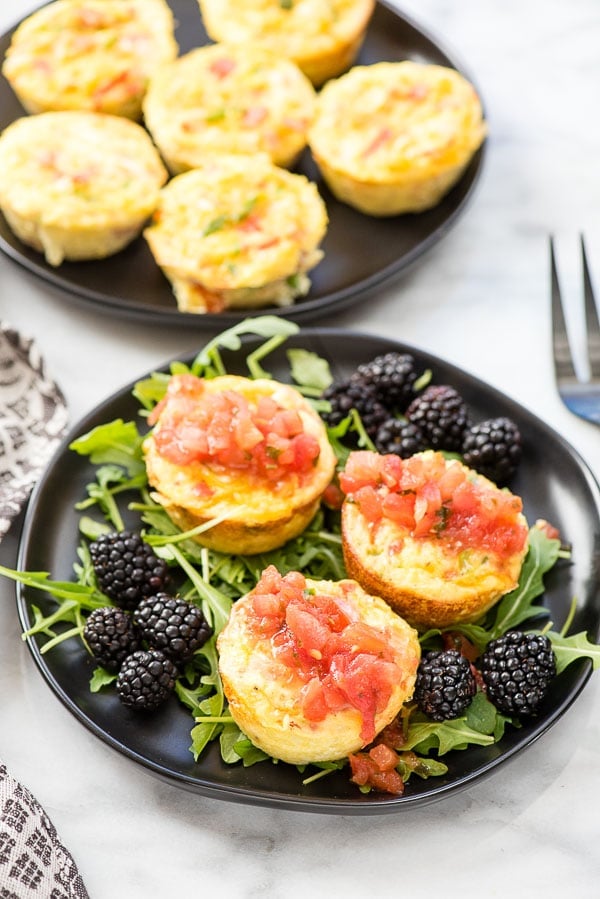 Plate of arugula, Muffin Tin Denver Omelet topped with salsa