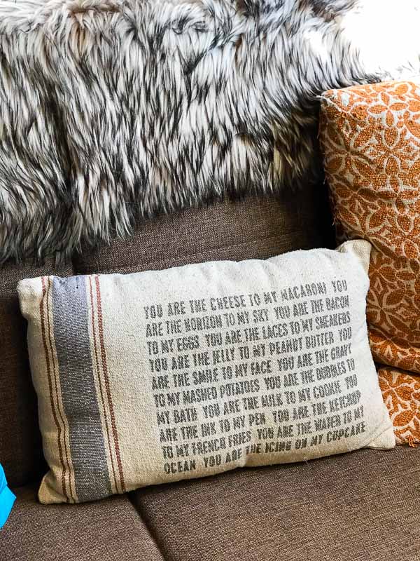 Verse pillow on couch at the Hobbit House