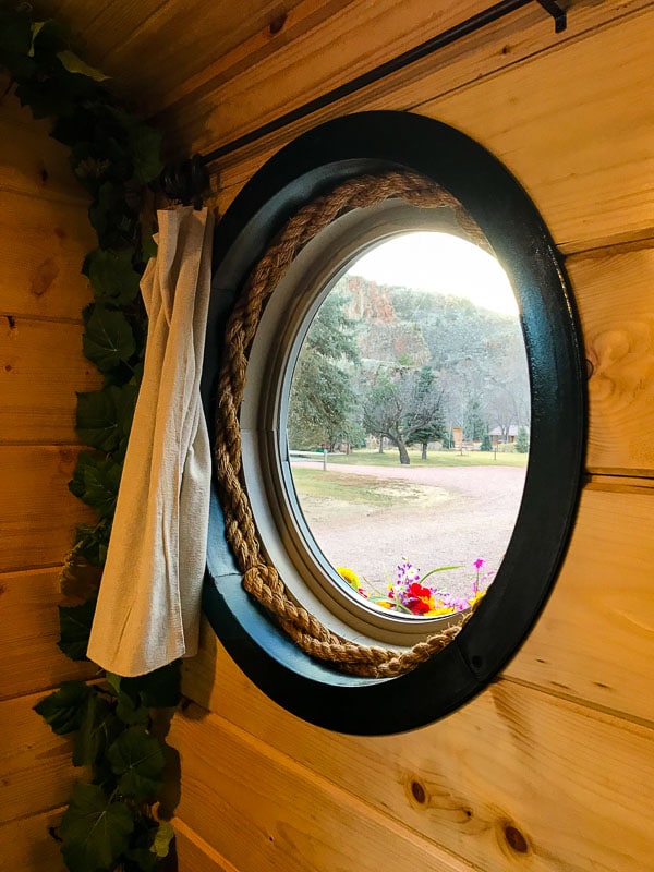 Round window with flower box at the Hobbit House