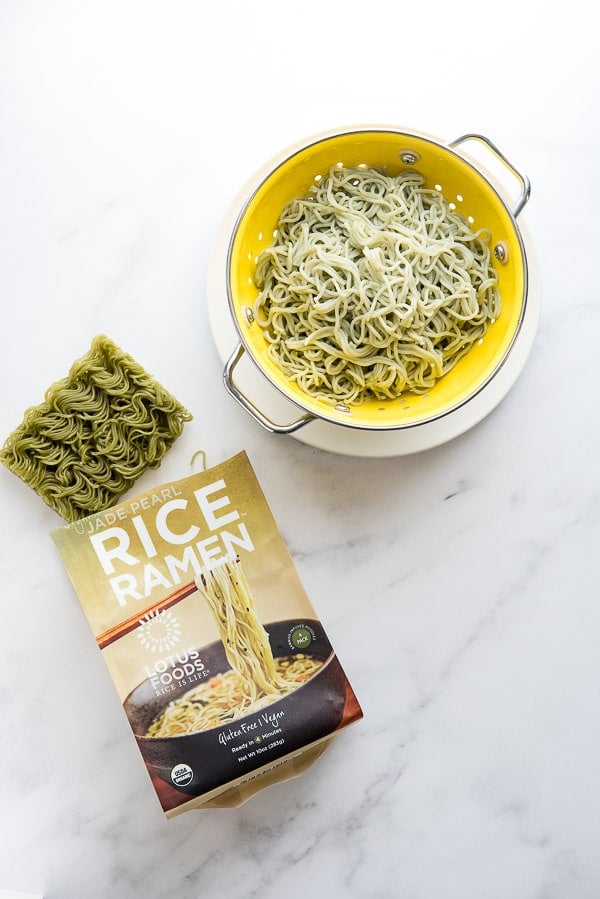 cooked gluten free ramen in a yellow colander