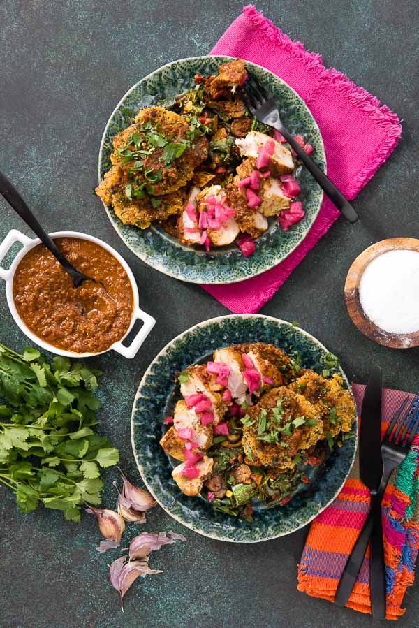 Two plates of gluten-free paleo mole-roasted chicken, arepas, sauteed vegetables with mole sauce from Green Chef meal kit delivery service