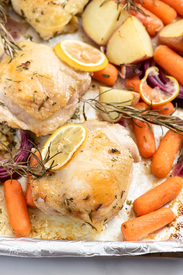 chicken thigh with potatoes, carrots and rosemary