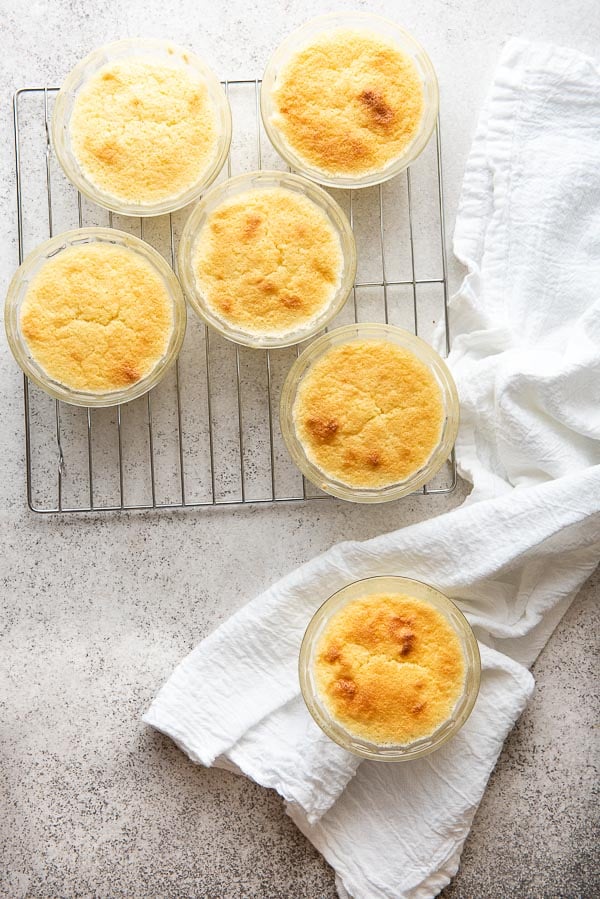 Lemon Baked Custard with Sponge Cake Top on cooling rack with white kitchen towel
