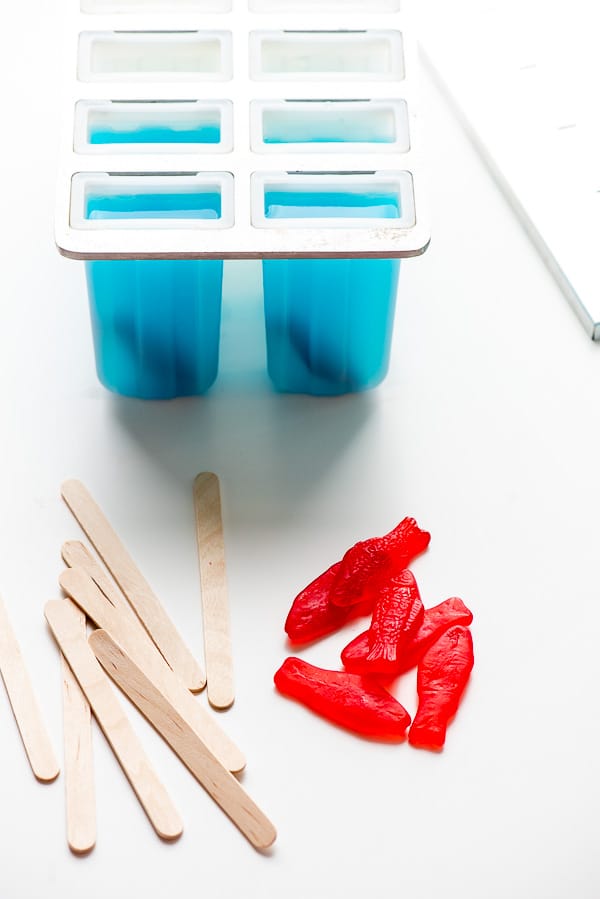 Blue Lagoon Cocktail popsciles in popsicle mold to be frozen