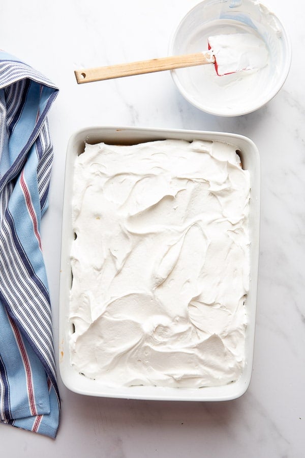 Red White and Blue Cake with whipped cream frosting