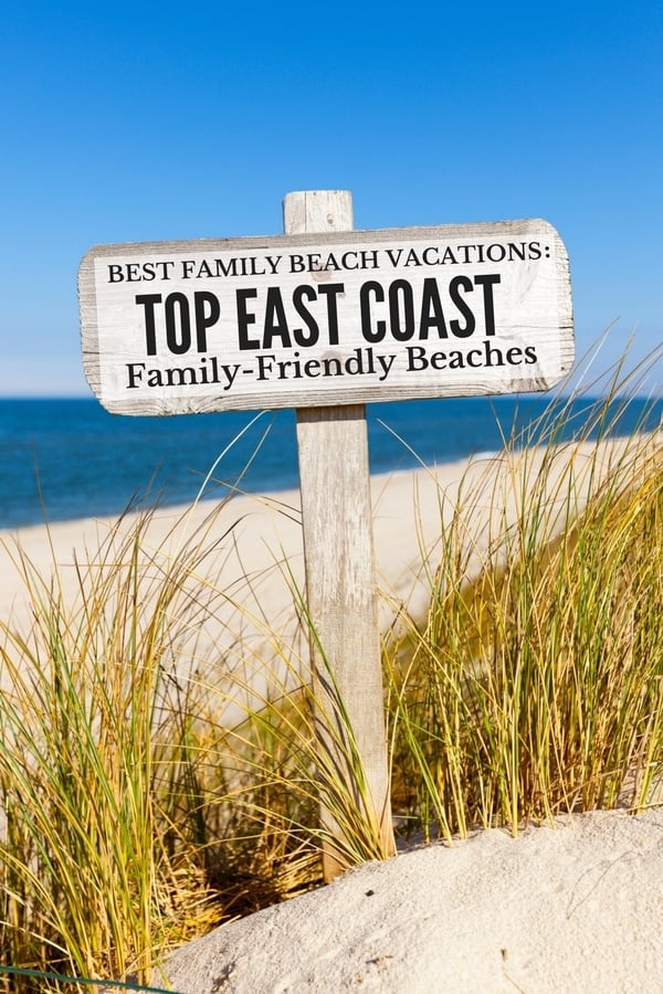 Best East Coast Beaches wooden sign on beach