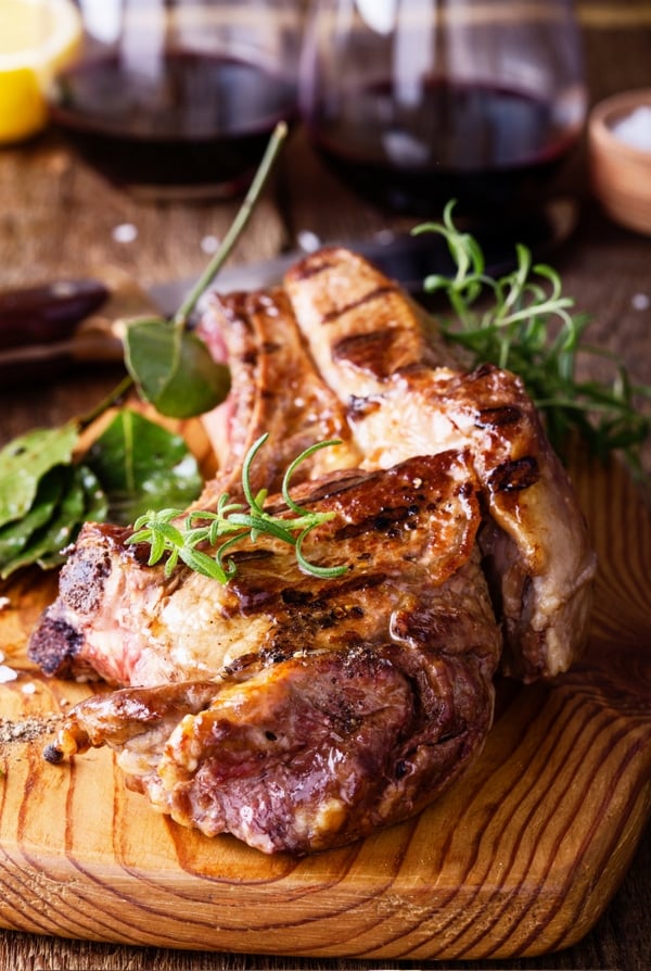 Grilled steak on cutting board