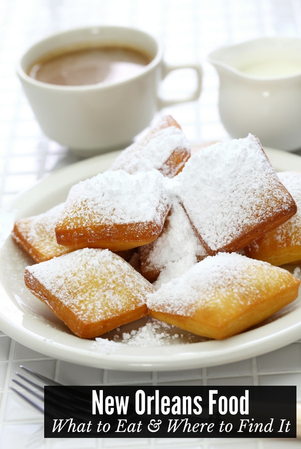 New Orleans food: Beignets on a white plate with coffee