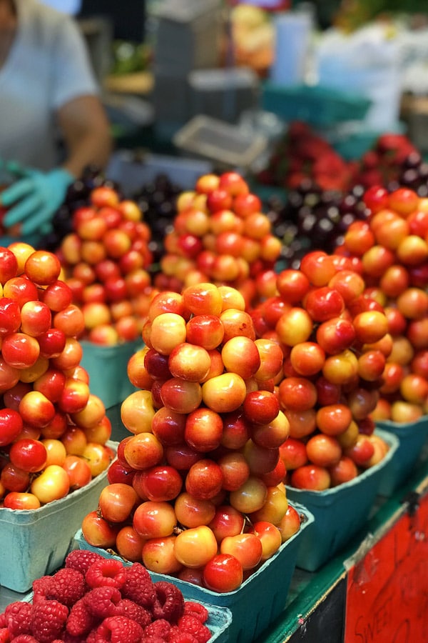 Stacks of fresh Cherries at Granville Island Maket Vancouver BC