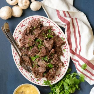 Creamy Mushroom Instant Pot Pot roast on a platter title image