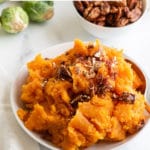 Mashed Instant Pot Sweet Potatoes in a white bowl