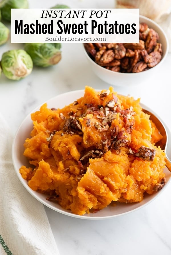 Mashed Instant Pot Sweet Potatoes in a white bowl