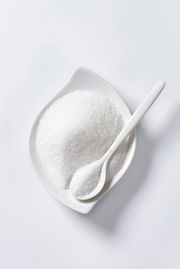 white bowl of granulated sugar