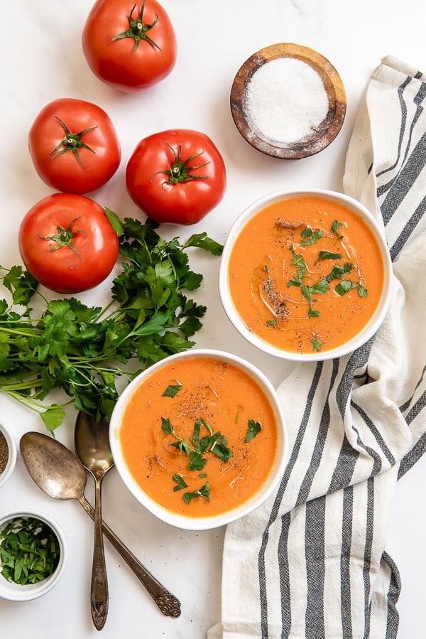 homemade tomato soup in white bowl 2 servings 