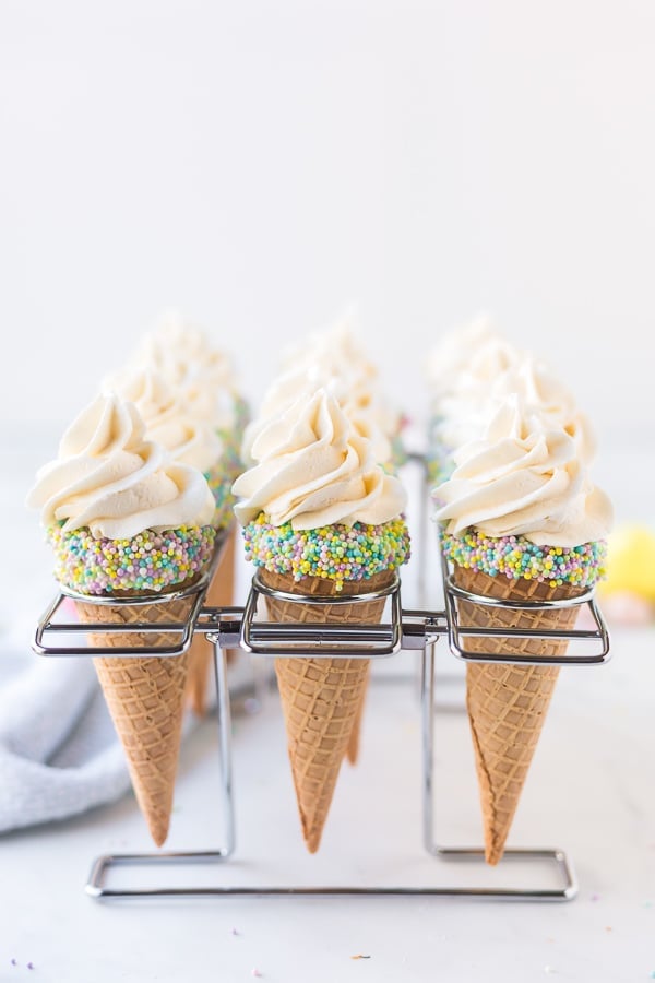 Frosted Easter cupcakes in cone rack 