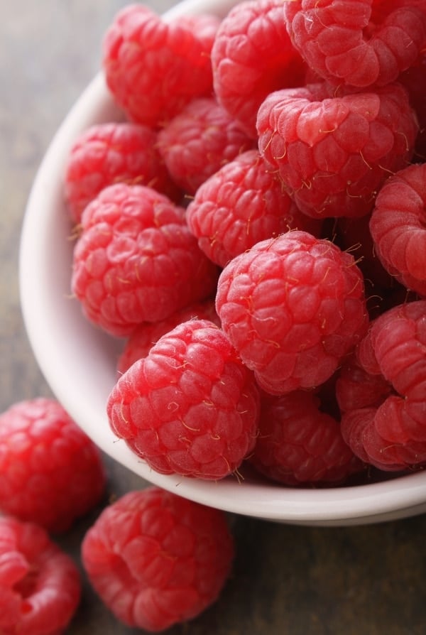 fresh raspberries in a cup