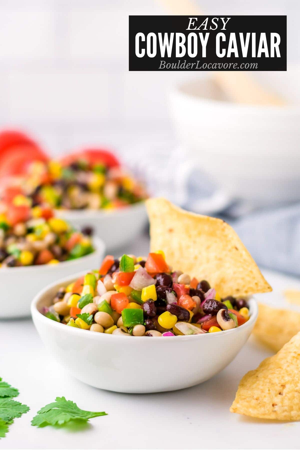 bowls of Cowboy Caviar with tortilla chips (title image)