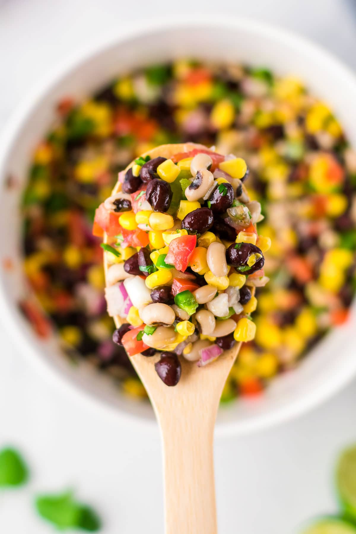 cowboy caviar in bowl with spoonful