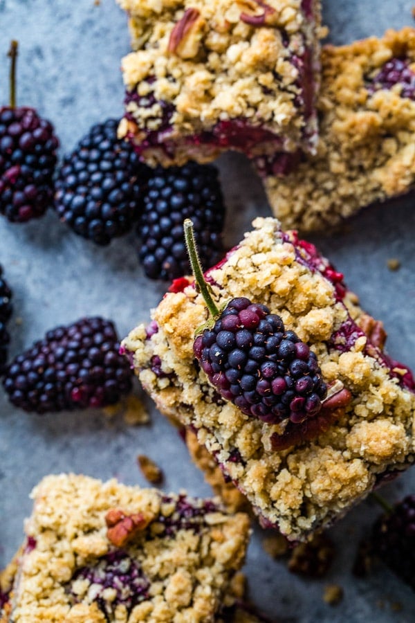 oatmeal bars with blackberry on top overhead 