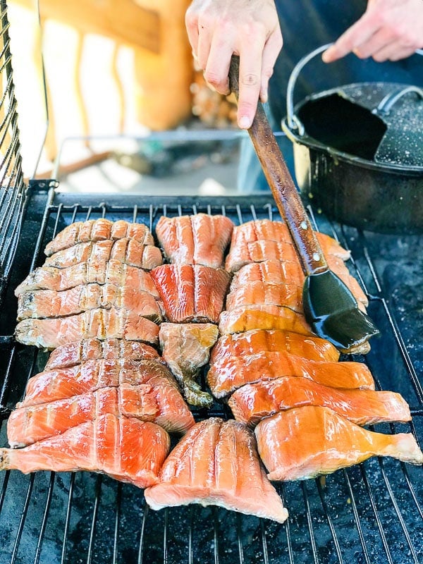 grilling salmon at Taku Lodge 